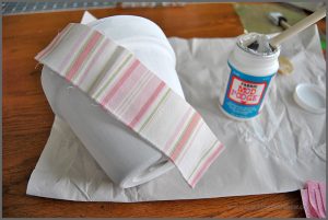 Decorate your space with a Fabric Covered Flower Pot. Visit Sparkles of Sunshine to learn how to use Mod Podge and fabric to decorate your boring flower pots!