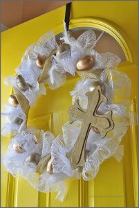 Check out this Golden Egg Easter Wreath made with plastic eggs, lace and a hot glue gun at Sparkles of Sunshine.