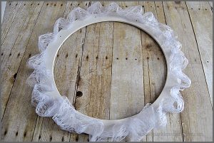 Check out this Golden Egg Easter Wreath made with plastic eggs, lace and a hot glue gun at Sparkles of Sunshine.