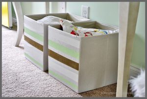 Have cheap storage bins lacking personality? Check out this easy storage bin makeover at Sparkles of Sunshine! All you need is painters tape, paint and a little time to make this easy transformation!