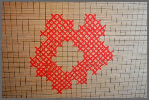 Looking for an affordable artwork option? Try DIY Cross Stitch Art Using Plywood!