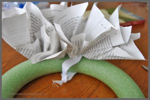 Make a book page wreath in just 3 easy steps, a simple tutorial at Sparkles of Sunshine.