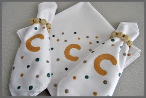 It's easy to make personalized napkins with fabric paint! Check out the simple tutorial at Sparkles of Sunshine.