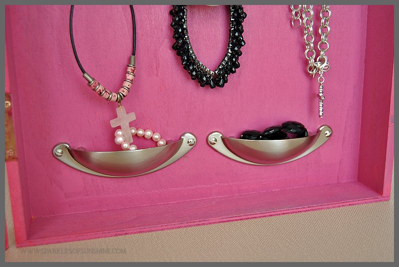 Create a unique jewelry organizer using a shadowbox and sheet metal. Get the details at Sparkles of Sunshine.