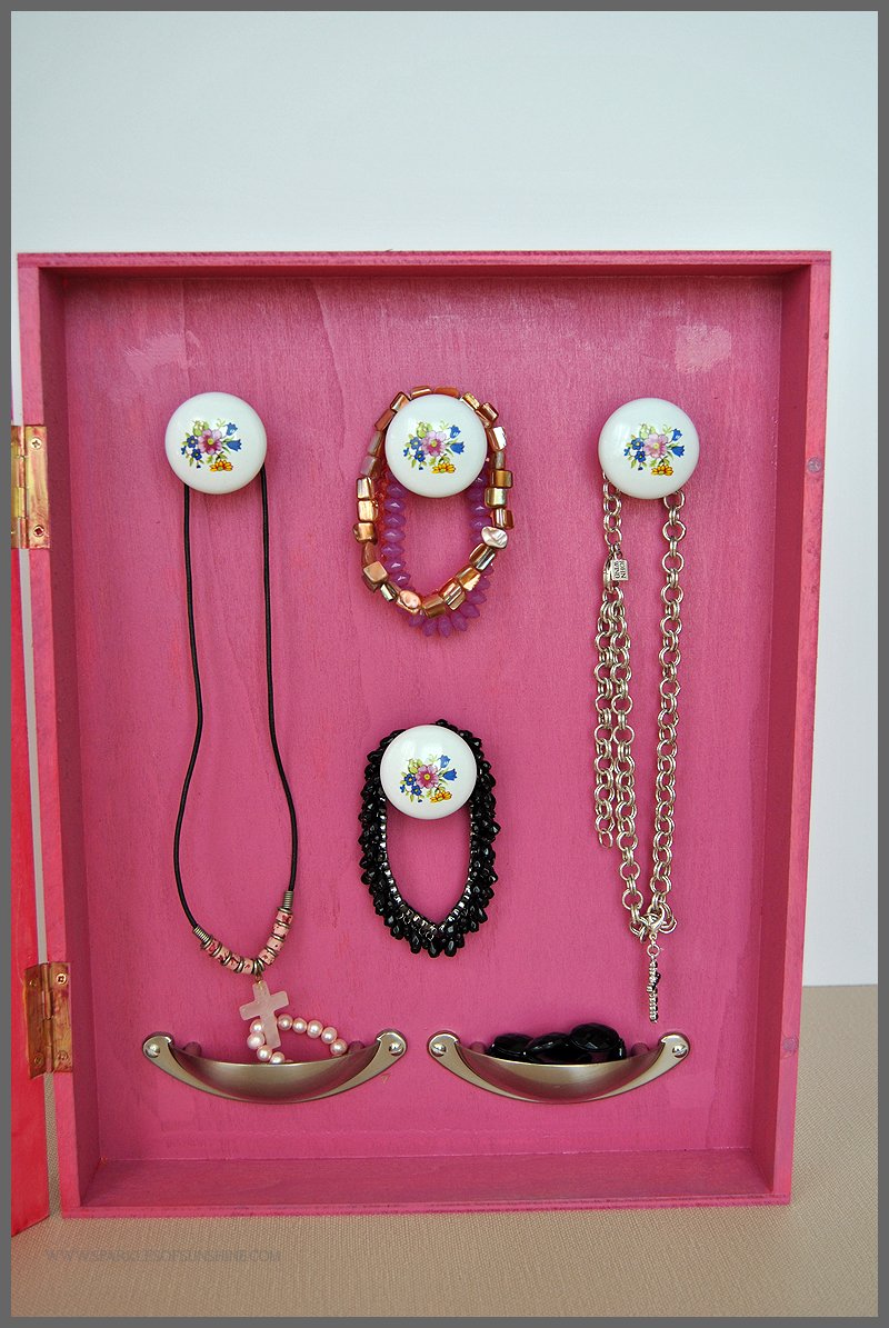 Create a unique jewelry organizer using a shadowbox and sheet metal. Get the details at Sparkles of Sunshine.
