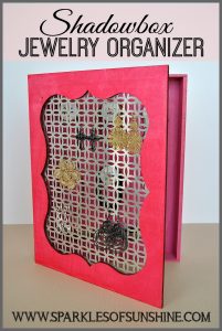 Create a unique jewelry organizer using a shadowbox and sheet metal. Get the details at Sparkles of Sunshine.