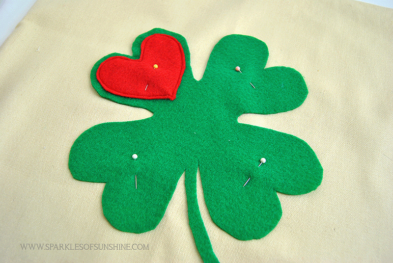 You are going to love this lucky four leaf clover pillow cover. It's the perfect way to add a St. Patrick's Day touch to your home decor this year!