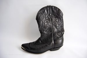 Add a little spring to your step by transforming an old boot into a colorful cowboy boot planter.