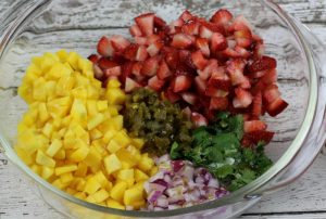 Move the boring salsa to the fridge, because this recipe for Strawberry Mango Salsa recipe could easily become your family's new favorite!