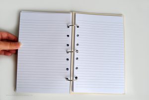 See how easy it is to make your own upcycled DIY notebook from a vinyl flooring sample.