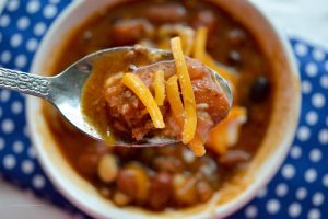 Warm up once cooler weather hits with this tasty recipe for Four Bean Crockpot Chili.