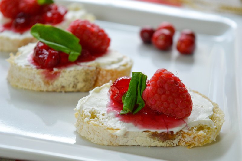 Add some color to your holiday spread with this easy appetizer idea. Get the recipe for Berries and Cream Holiday Inspired Bruschetta today!
