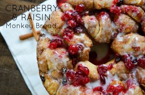 Celebrate the holidays with a tasty recipe for Cranberry & Raisin Monkey Bread. Not only does it make a beautiful display, but it's super delicious, too. Get the recipe at Sparkles of Sunshine today.