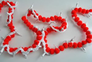 Make your Christmas tree pop this year with a colorful crochet pom pom lighted garland. Get the details at Sparkles of Sunshine today!