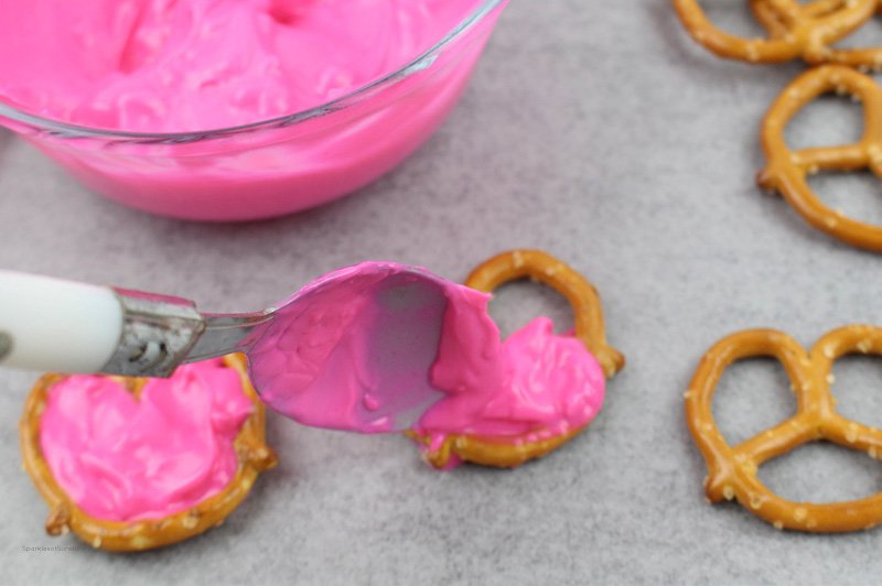 Spread the love this Valentine's Day by making these easy Conversation Heart Pretzel Bites.