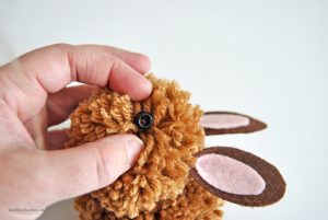 Learn how to make pom pom Easter bunnies. These sweet little bunnies are the perfect addition to Easter baskets!