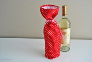 You've got the perfect bottle of wine for a hostess gift, but now what?? Dress it up a bit with this fun project. Learn how to make an easy sew wine gift bag in just minutes!
