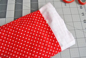 You've got the perfect bottle of wine for a hostess gift, but now what?? Dress it up a bit with this fun project. Learn how to make an easy sew wine gift bag in just minutes!
