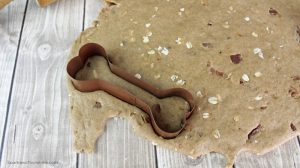 Don't forget about your furry friends this holiday season. Fill their stocking with these tasty peanut butter & bacon homemade dog treats!